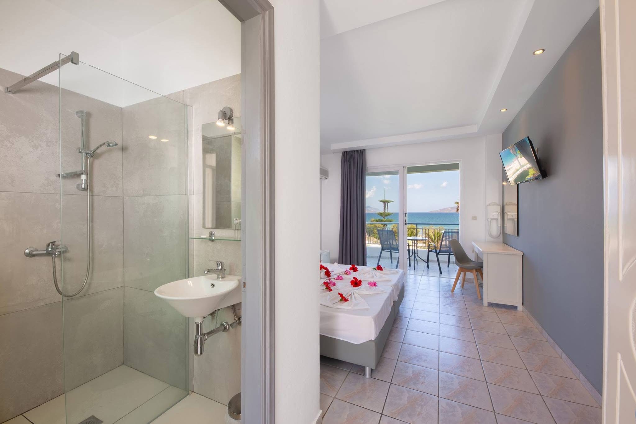 Double Room Pool View or Side Sea View